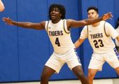  Kelly headlines Tigers basketball on all-district team